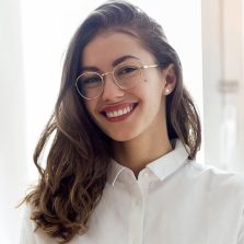 beautiful-smiling-businesswoman-with-eyeglasses-2F9GDZX.jpg